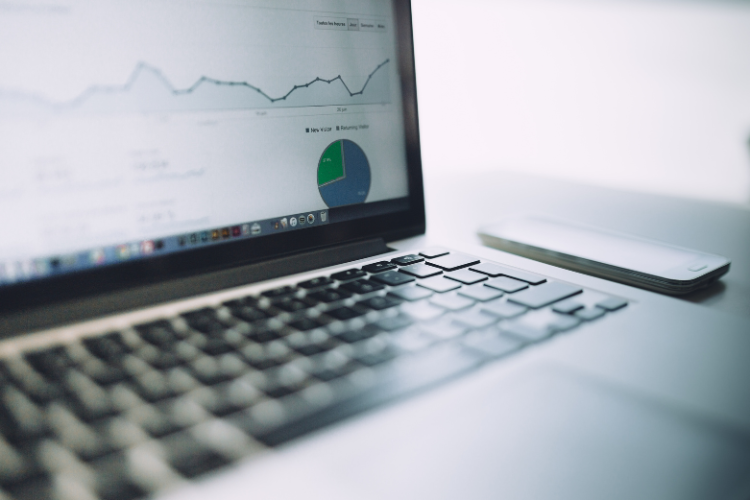 Laptop screen with metrics